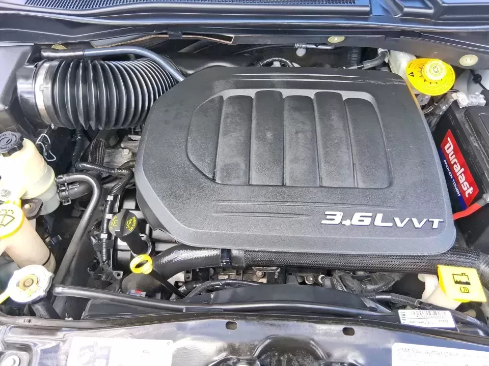 2014 Chrysler Town and Country Limited (2C4RC1GGXER) with an Pentastar 3.6L V-6 DOHC engine, 6-Speed Automatic transmission, located at 4508 South Dixie Dr, Moraine, OH, 45439, (937) 908-9800, 39.689976, -84.218452 - Road-trip ready and family-approved, this 2014 Chrysler Town and Country Limited is the kind of minivan that fits real life in Moraine-school drop-offs, grocery runs, weekend tournaments, and those longer drives up I-75 or across town toward Dayton. Finished in Bright White Clearcoat, it blends a - Photo#10