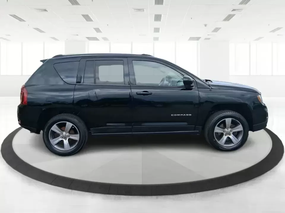 2017 Jeep Compass High Altitude FWD (1C4NJCEBXHD) with an 2.4L L4 DOHC 16V engine, CVT transmission, located at 1951 S Dayton Lakeview Rd., New Carlisle, OH, 45344, (937) 908-9800, 39.890999, -84.050255 - Picture your next week looking simpler: a comfortable SUV for the daily commute down I70, school drop-offs, and spontaneous Saturday drives to Buck Creek State Park-without feeling like you have to put your life on hold while you shop for financing. This 2017 Jeep Compass High Altitude FWD in Black - Photo#1