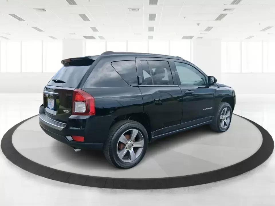 2017 Jeep Compass High Altitude FWD (1C4NJCEBXHD) with an 2.4L L4 DOHC 16V engine, CVT transmission, located at 1951 S Dayton Lakeview Rd., New Carlisle, OH, 45344, (937) 908-9800, 39.890999, -84.050255 - Picture your next week looking simpler: a comfortable SUV for the daily commute down I70, school drop-offs, and spontaneous Saturday drives to Buck Creek State Park-without feeling like you have to put your life on hold while you shop for financing. This 2017 Jeep Compass High Altitude FWD in Black - Photo#2