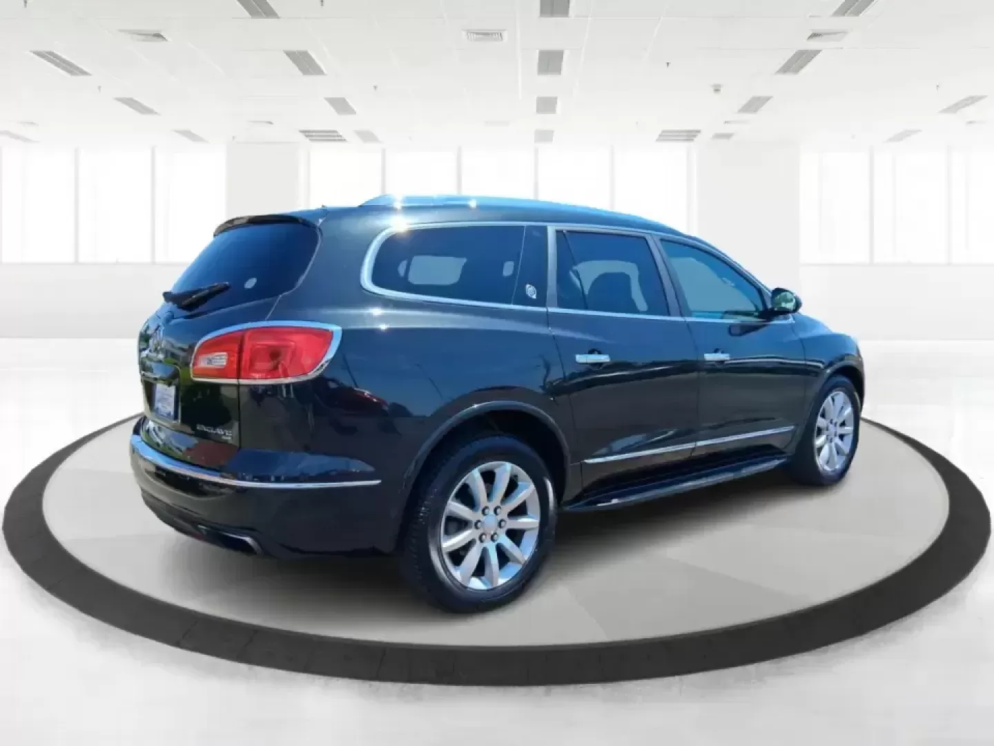 2013 Buick Enclave Premium (5GAKVDKDXDJ) with an 3.6L V-6 gasoline direct injection engine, 6-Speed Automatic Overdrive transmission, located at 880 E. National Road, Vandalia, OH, 45377, (937) 908-9800, 39.891918, -84.183594 - Pack up the kids, cue up a road-trip playlist, and head out with confidence-this 2013 Buick Enclave Premium is built for real life in and around Vandalia, whether you're doing school drop-offs, commuting to Dayton, or loading up for a weekend at Taylorsville MetroPark. With three-row versatility, up - Photo#2