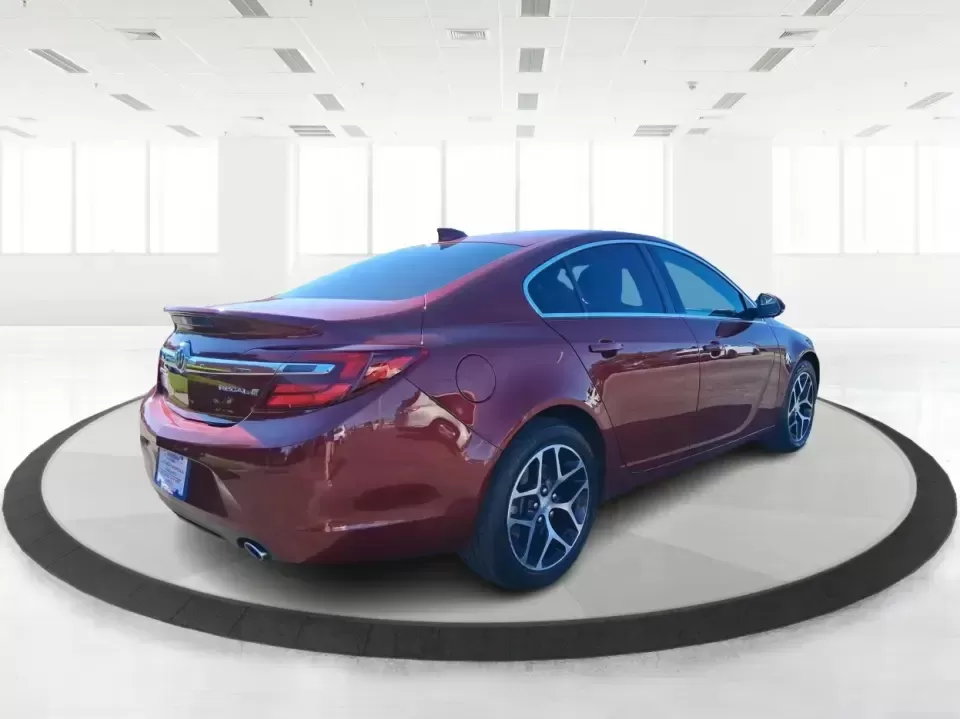 2017 Buick Regal Turbo Sport Touring (2G4GL5EX9H9) with an 2L I-4 gasoline direct injection engine, 6A transmission, located at 8750 N County Rd 25A, Piqua, OH, 45356, (937) 908-9800, 40.164391, -84.232513 - Need a sporty, comfortable commuter that still feels special on date night, errands around town, or a weekend run up I75? This 2017 Buick Regal Turbo Sport Touring in Crimson Red Tintcoat fits the lifestyle of drivers who want a refined sedan with confident power for daily miles, plus the kind of fe - Photo#2
