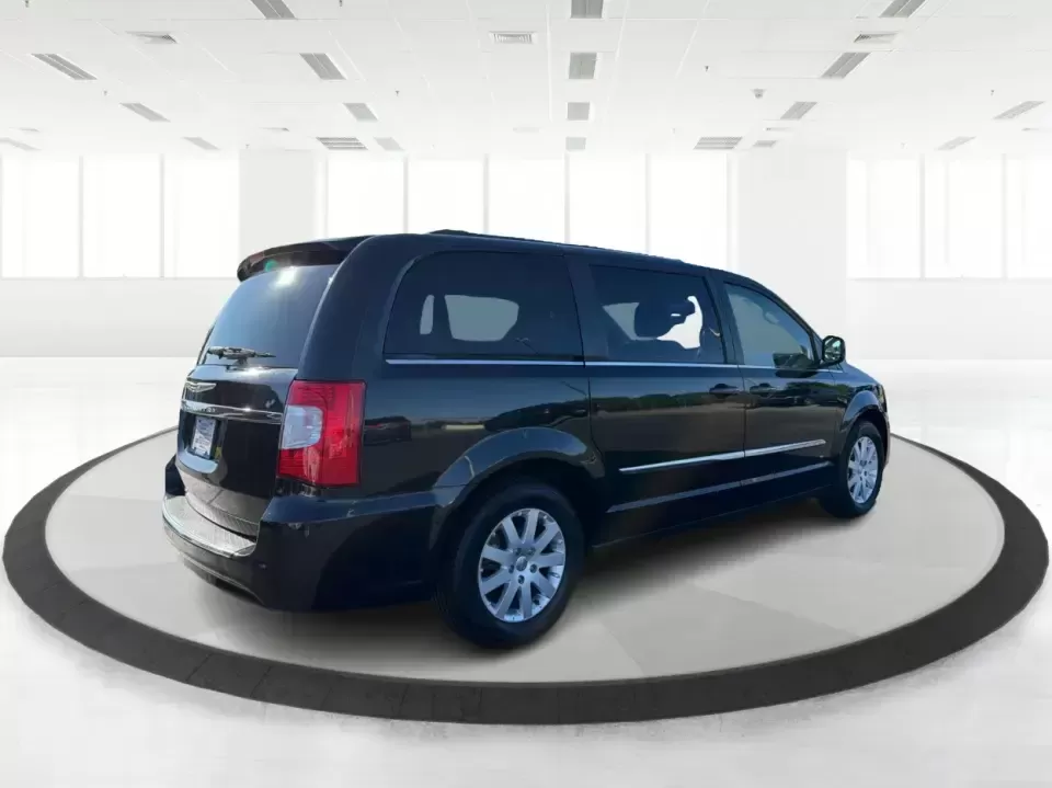 2013 Chrysler Town and Country Touring (2C4RC1BG8DR) with an Pentastar 3.6L V-6 DOHC engine, 6-Speed Automatic transmission, located at 8750 N County Rd 25A, Piqua, OH, 45356, (937) 908-9800, 40.164391, -84.232513 - Road-trip weekends, school drop-offs, and big-box store runs feel a lot easier when you've got a minivan that's built for real life. This 2013 Chrysler Town and Country Touring in Brilliant Black Crystal Pearlcoat is a smart pick for growing families, busy commuters, and budget-conscious buyers wh - Photo#2