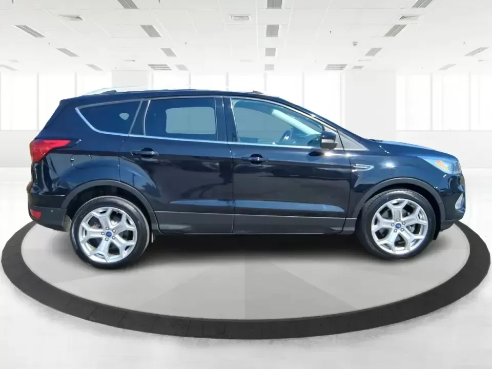 2019 Ford Escape Titanium (1FMCU9J9XKU) with an EcoBoost 2L I-4 gasoline direct injection engine, 6A transmission, located at 8750 N County Rd 25A, Piqua, OH, 45356, (937) 908-9800, 40.164391, -84.232513 - Pack up the kids, load the groceries, or point the hood toward a weekend getaway-this 2019 Ford Escape Titanium 4WD is built for real life in West Central Ohio, where commutes, school drop-offs, and quick trips up I75 all happen in the same week. With an upscale Titanium cabin and confident all-weat - Photo#1