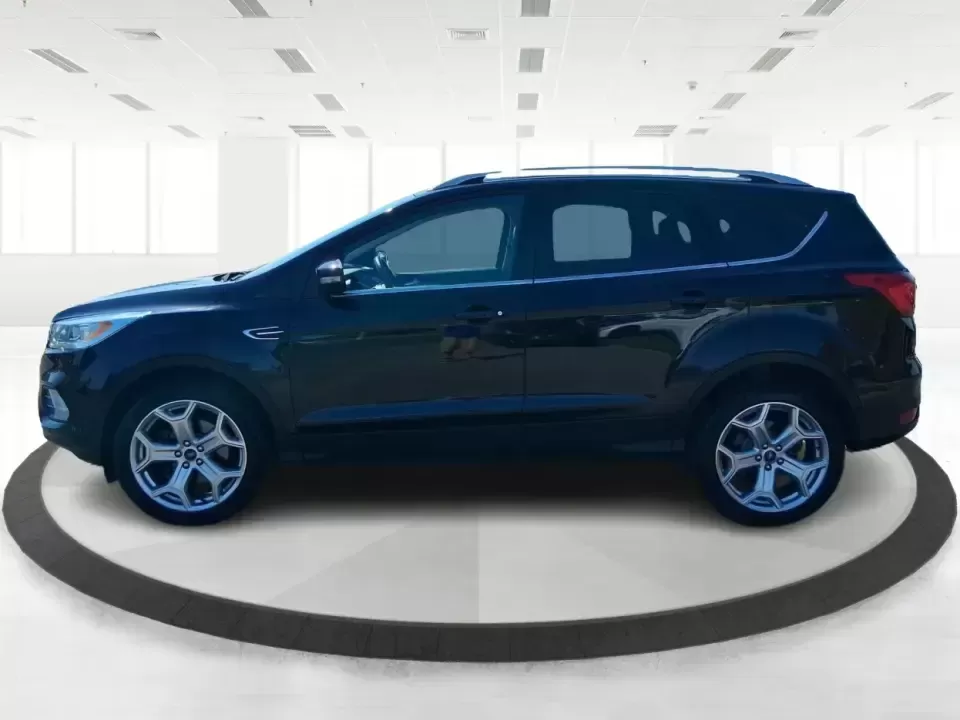 2019 Ford Escape Titanium (1FMCU9J9XKU) with an EcoBoost 2L I-4 gasoline direct injection engine, 6A transmission, located at 8750 N County Rd 25A, Piqua, OH, 45356, (937) 908-9800, 40.164391, -84.232513 - Pack up the kids, load the groceries, or point the hood toward a weekend getaway-this 2019 Ford Escape Titanium 4WD is built for real life in West Central Ohio, where commutes, school drop-offs, and quick trips up I75 all happen in the same week. With an upscale Titanium cabin and confident all-weat - Photo#5