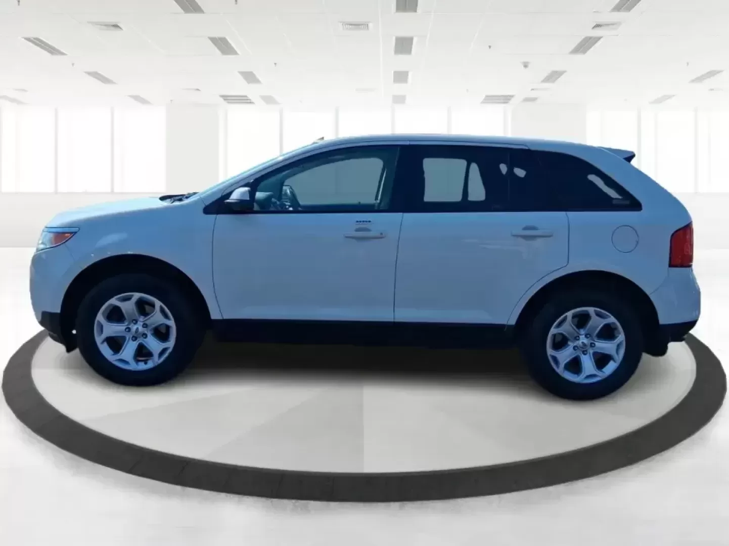 2013 Ford Edge SEL (2FMDK3JC2DB) with an 3.5L V6 DOHC 24V engine, 6-Speed Automatic transmission, located at 8750 N County Rd 25A, Piqua, OH, 45356, (937) 908-9800, 40.164391, -84.232513 - Picture your next road trip up I75 or a busy week of school dropoffs and commuting done in a roomy SUV that feels comfortable, confident, and ready for everyday Ohio life. This 2013 Ford Edge SEL is a smart fit for drivers who want midsize versatility without the bulky footprint-great for growing fa - Photo#5