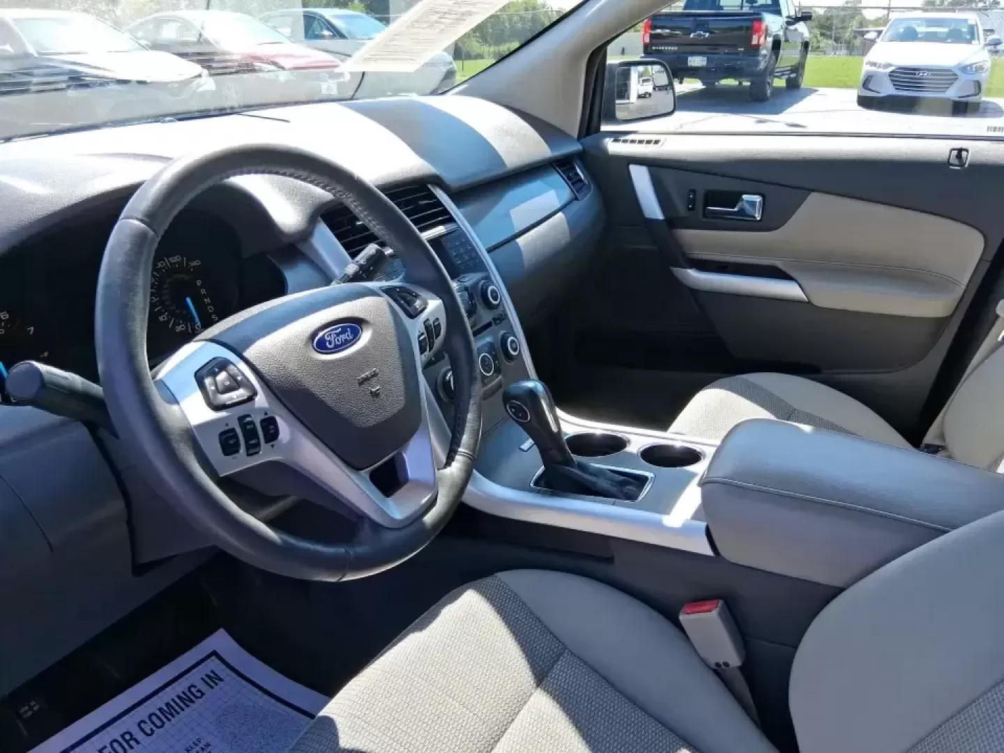 2013 Ford Edge SEL (2FMDK3JC2DB) with an 3.5L V6 DOHC 24V engine, 6-Speed Automatic transmission, located at 8750 N County Rd 25A, Piqua, OH, 45356, (937) 908-9800, 40.164391, -84.232513 - Picture your next road trip up I75 or a busy week of school dropoffs and commuting done in a roomy SUV that feels comfortable, confident, and ready for everyday Ohio life. This 2013 Ford Edge SEL is a smart fit for drivers who want midsize versatility without the bulky footprint-great for growing fa - Photo#9