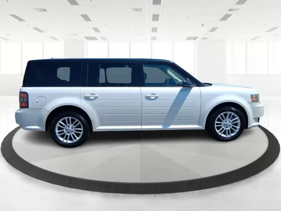 2011 Ford Flex Titanium (2FMGK5DC2BB) with an Duratec 3.5L V-6 DOHC engine, 6-Speed Automatic Overdrive transmission, located at 1951 S Dayton Lakeview Rd., New Carlisle, OH, 45344, (937) 908-9800, 39.890999, -84.050255 - Road-trip ready and family-friendly without feeling like a bus, this 2011 Ford Flex Limited | Titanium is the kind of crossover that fits real life-school drop-offs, long commutes, weekend tournaments, and those last-minute runs for groceries when the cargo space actually matters. Finished in White - Photo#1