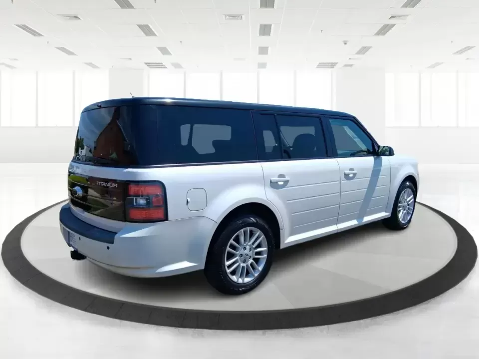 2011 Ford Flex Titanium (2FMGK5DC2BB) with an Duratec 3.5L V-6 DOHC engine, 6-Speed Automatic Overdrive transmission, located at 1951 S Dayton Lakeview Rd., New Carlisle, OH, 45344, (937) 908-9800, 39.890999, -84.050255 - Road-trip ready and family-friendly without feeling like a bus, this 2011 Ford Flex Limited | Titanium is the kind of crossover that fits real life-school drop-offs, long commutes, weekend tournaments, and those last-minute runs for groceries when the cargo space actually matters. Finished in White - Photo#2