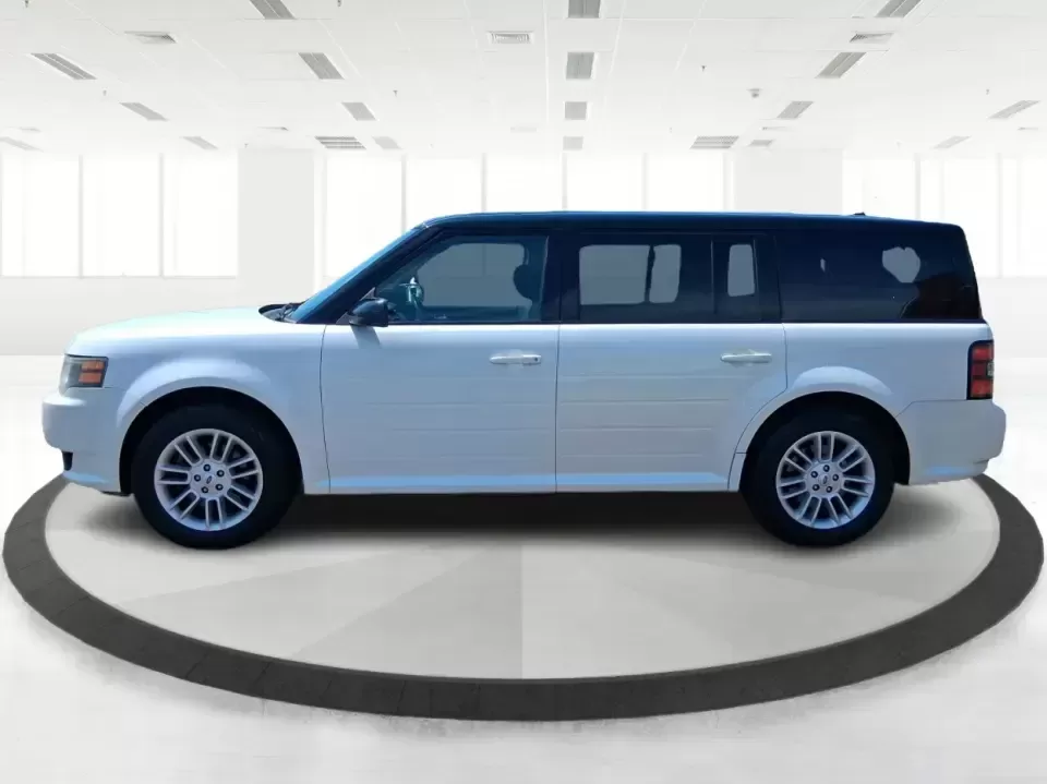2011 Ford Flex Titanium (2FMGK5DC2BB) with an Duratec 3.5L V-6 DOHC engine, 6-Speed Automatic Overdrive transmission, located at 1951 S Dayton Lakeview Rd., New Carlisle, OH, 45344, (937) 908-9800, 39.890999, -84.050255 - Road-trip ready and family-friendly without feeling like a bus, this 2011 Ford Flex Limited | Titanium is the kind of crossover that fits real life-school drop-offs, long commutes, weekend tournaments, and those last-minute runs for groceries when the cargo space actually matters. Finished in White - Photo#5