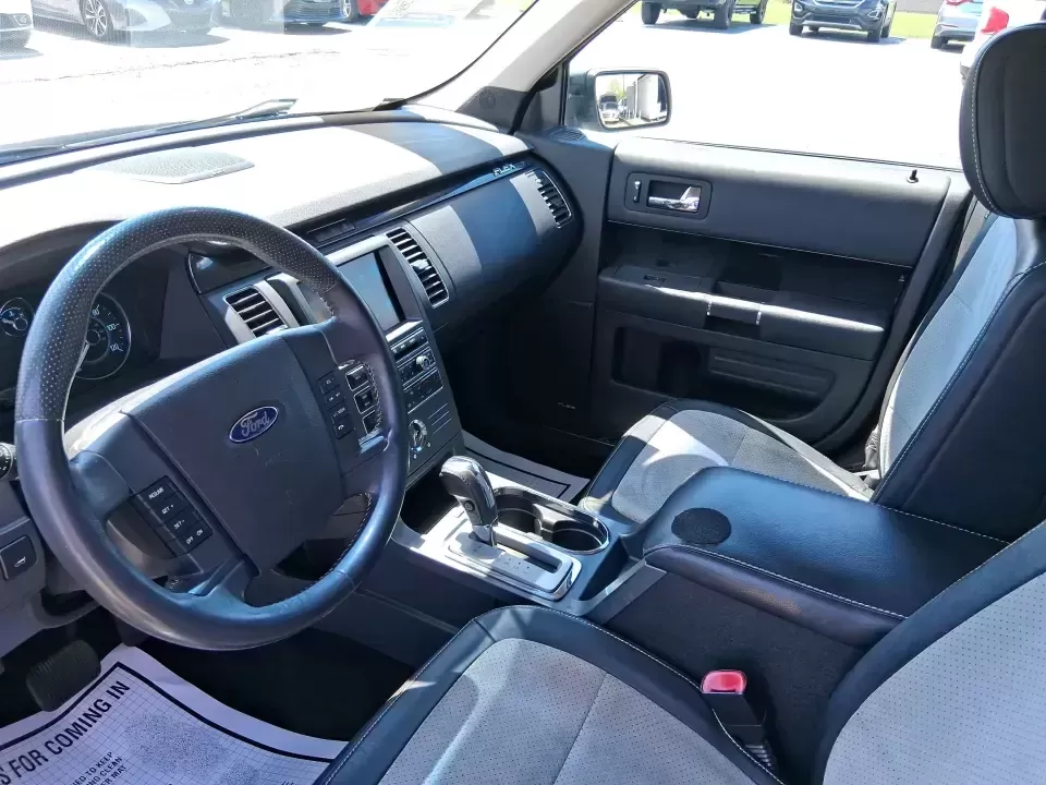 2011 Ford Flex Titanium (2FMGK5DC2BB) with an Duratec 3.5L V-6 DOHC engine, 6-Speed Automatic Overdrive transmission, located at 1951 S Dayton Lakeview Rd., New Carlisle, OH, 45344, (937) 908-9800, 39.890999, -84.050255 - Road-trip ready and family-friendly without feeling like a bus, this 2011 Ford Flex Limited | Titanium is the kind of crossover that fits real life-school drop-offs, long commutes, weekend tournaments, and those last-minute runs for groceries when the cargo space actually matters. Finished in White - Photo#9
