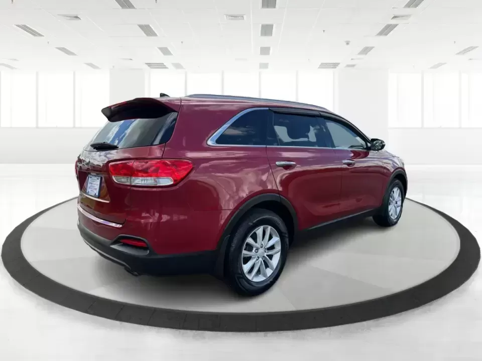 2016 Kia Sorento 2.4L LX (5XYPG4A38GG) with an 2.4L I-4 gasoline direct injection engine, 6-Speed Automatic transmission, located at 880 E. National Road, Vandalia, OH, 45377, (937) 908-9800, 39.891918, -84.183594 - Load up the family, point the hood toward I75, and make weekend plans feel easy again-this 2016 Kia Sorento LX is the kind of midsize SUV that fits real life in Vandalia, from school runs and grocery stops to road trips toward Dayton or a quick getaway out by the Great Miami River. Finished in stand - Photo#2
