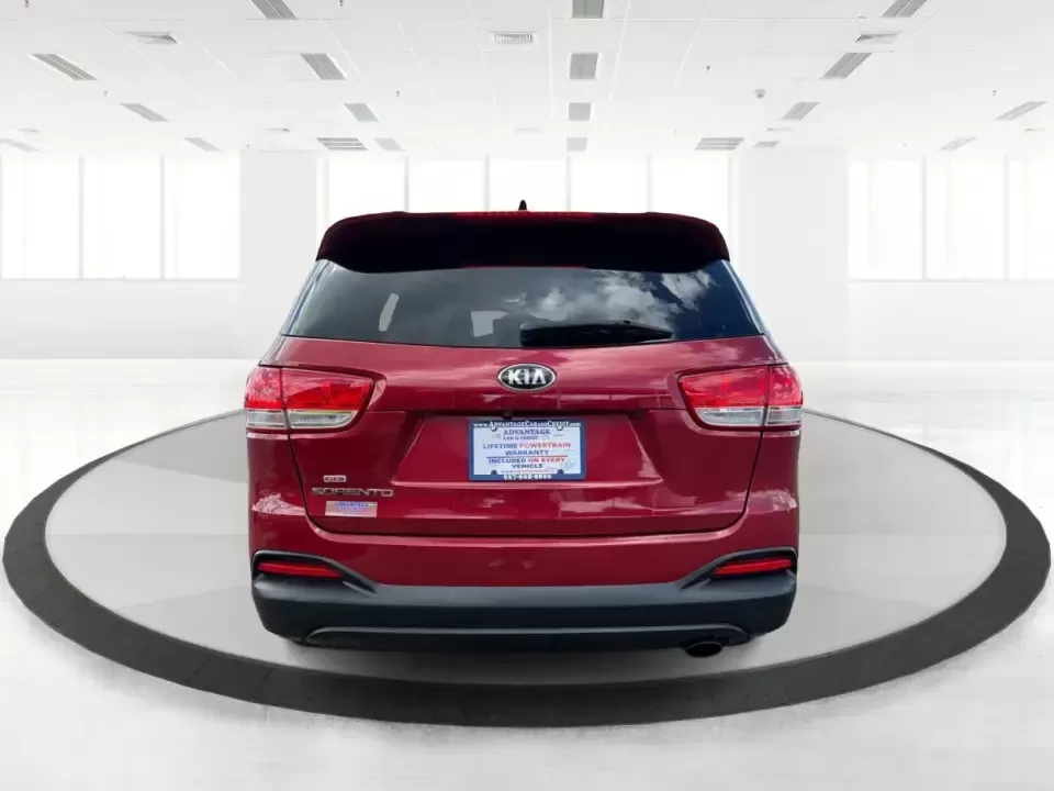 2016 Kia Sorento 2.4L LX (5XYPG4A38GG) with an 2.4L I-4 gasoline direct injection engine, 6-Speed Automatic transmission, located at 880 E. National Road, Vandalia, OH, 45377, (937) 908-9800, 39.891918, -84.183594 - Load up the family, point the hood toward I75, and make weekend plans feel easy again-this 2016 Kia Sorento LX is the kind of midsize SUV that fits real life in Vandalia, from school runs and grocery stops to road trips toward Dayton or a quick getaway out by the Great Miami River. Finished in stand - Photo#3