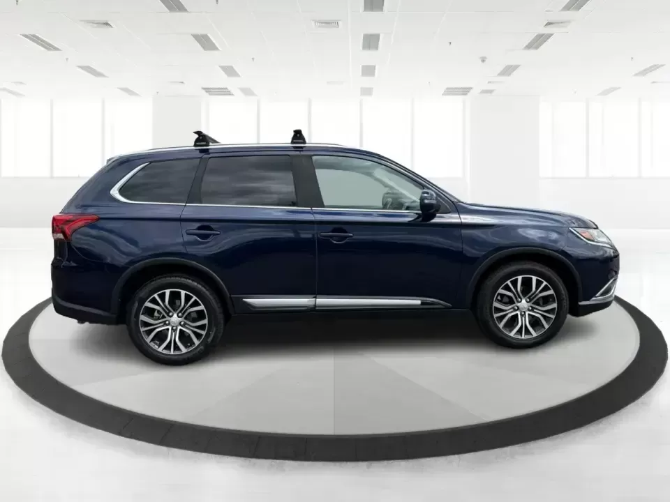 2018 Mitsubishi Outlander SEL (JA4AD3A39JJ) with an 2.4L I-4 variable valve control engine, CVT transmission, located at 1230 East Main St, Xenia, OH, 45385, (937) 908-9800, 39.688026, -83.910172 - Weekend road trips to John Bryan State Park, daily commutes down US-35, or school-drop runs around Xenia's neighborhoods-this 2018 Mitsubishi Outlander SEL is the kind of SUV that fits real life. Finished in eye-catching Cosmic Blue Metallic and built with three-row flexibility, it's a smart pick fo - Photo#1