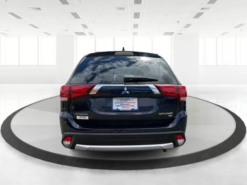 2018 Mitsubishi Outlander SEL (JA4AD3A39JJ) with an 2.4L I-4 variable valve control engine, CVT transmission, located at 1230 East Main St, Xenia, OH, 45385, (937) 908-9800, 39.688026, -83.910172 - Weekend road trips to John Bryan State Park, daily commutes down US-35, or school-drop runs around Xenia's neighborhoods-this 2018 Mitsubishi Outlander SEL is the kind of SUV that fits real life. Finished in eye-catching Cosmic Blue Metallic and built with three-row flexibility, it's a smart pick fo - Photo#3