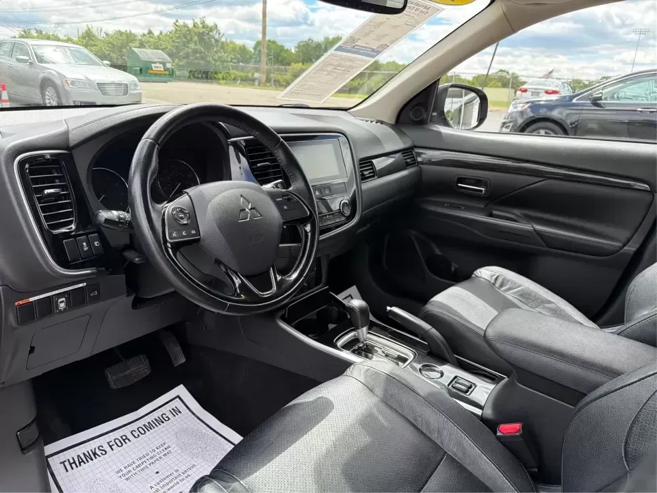 2018 Mitsubishi Outlander SE 2WD (JA4AD3A39JJ) with an 2.4L L4 DOHC 16V engine, CVT transmission, located at 4508 South Dixie Dr, Moraine, OH, 45439, (937) 908-9800, 39.689976, -84.218452 - Pack up the kids, load the groceries, or point the nose toward a weekend getaway-this **2018 Mitsubishi Outlander SEL** is the kind of SUV that fits real life in Moraine. With three-row flexibility, smart comfort features, and a road-trip-ready cabin, it's a strong match for **growing families**, ** - Photo#9