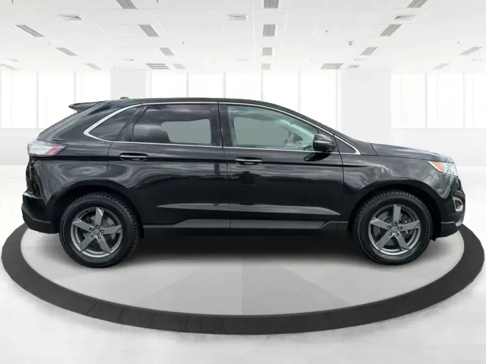 2015 Ford Edge Titanium (2FMTK4K82FB) with an 3.5L V6 DOHC 24V engine, 6-Speed Automatic transmission, located at 1184 Kauffman Ave, Fairborn, OH, 45324, (937) 908-9800, 39.807072, -84.030914 - Need a comfortable, confident SUV for Dayton-area commuting, school drop-offs, and spontaneous weekend getaways to Yellow Springs? This 2015 Ford Edge Titanium in Tuxedo Black Metallic blends everyday practicality with upscale features, giving you a road-trip-ready ride that fits a busy life in Fair - Photo#1