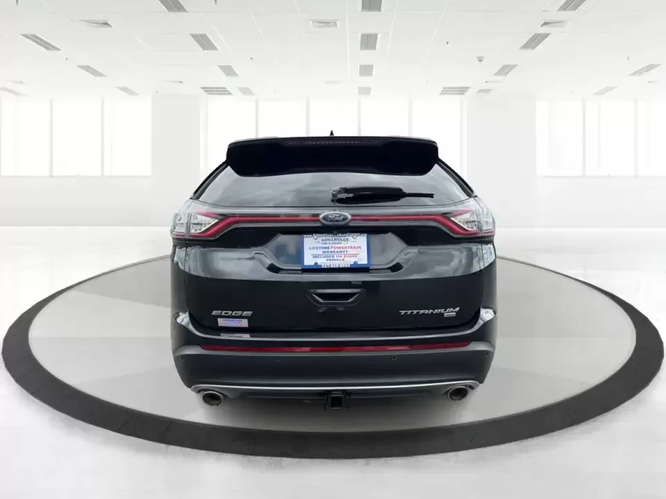 2015 Ford Edge Titanium (2FMTK4K82FB) with an 3.5L V6 DOHC 24V engine, 6-Speed Automatic transmission, located at 1184 Kauffman Ave, Fairborn, OH, 45324, (937) 908-9800, 39.807072, -84.030914 - Need a comfortable, confident SUV for Dayton-area commuting, school drop-offs, and spontaneous weekend getaways to Yellow Springs? This 2015 Ford Edge Titanium in Tuxedo Black Metallic blends everyday practicality with upscale features, giving you a road-trip-ready ride that fits a busy life in Fair - Photo#3