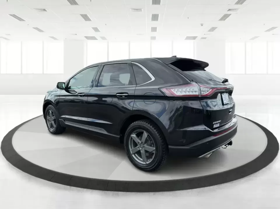 2015 Ford Edge Titanium (2FMTK4K82FB) with an 3.5L V6 DOHC 24V engine, 6-Speed Automatic transmission, located at 1184 Kauffman Ave, Fairborn, OH, 45324, (937) 908-9800, 39.807072, -84.030914 - Need a comfortable, confident SUV for Dayton-area commuting, school drop-offs, and spontaneous weekend getaways to Yellow Springs? This 2015 Ford Edge Titanium in Tuxedo Black Metallic blends everyday practicality with upscale features, giving you a road-trip-ready ride that fits a busy life in Fair - Photo#4