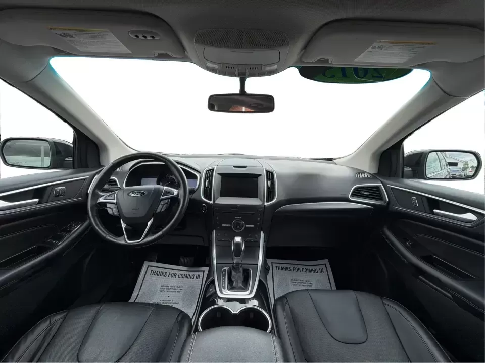 2015 Ford Edge Titanium (2FMTK4K82FB) with an 3.5L V6 DOHC 24V engine, 6-Speed Automatic transmission, located at 1184 Kauffman Ave, Fairborn, OH, 45324, (937) 908-9800, 39.807072, -84.030914 - Need a comfortable, confident SUV for Dayton-area commuting, school drop-offs, and spontaneous weekend getaways to Yellow Springs? This 2015 Ford Edge Titanium in Tuxedo Black Metallic blends everyday practicality with upscale features, giving you a road-trip-ready ride that fits a busy life in Fair - Photo#22
