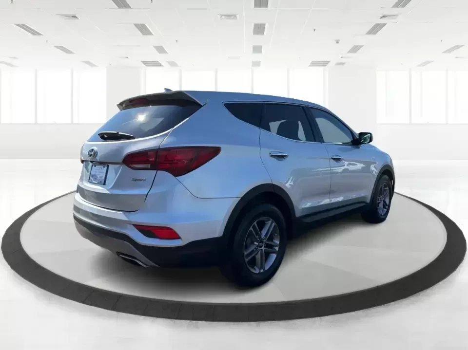 2017 Hyundai Santa Fe 2.4L (5XYZT3LB8HG) with an Theta II 2.4L I-4 gasoline direct injection engine, 6A transmission, located at 8750 N County Rd 25A, Piqua, OH, 45356, (937) 908-9800, 40.164391, -84.232513 - Load up the family, point the GPS toward a weekend getaway, and enjoy the confidence of an SUV that's built for everyday life in Ohio-this **2017 Hyundai Santa Fe 2.4L** is a smart pick for commuting, school runs, and road trips alike. Finished in **Sparkling Silver**, it brings the practical space - Photo#2