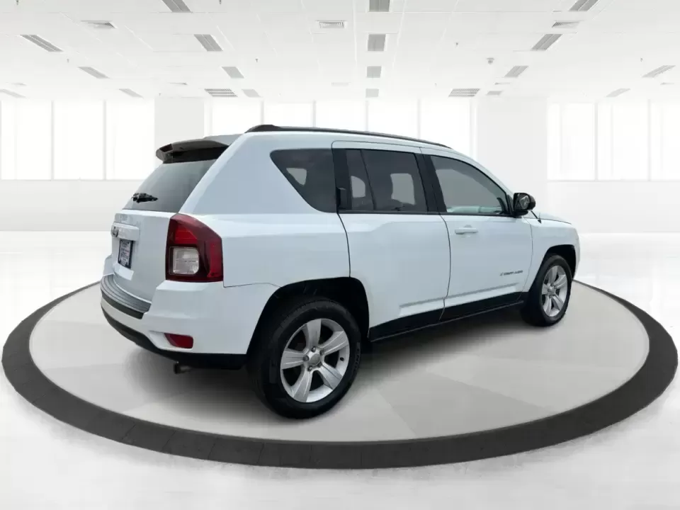 2016 Jeep Compass Sport (1C4NJCBA1GD) with an 2.0L L4 DOHC 16V engine, Automatic transmission, located at 4508 South Dixie Dr, Moraine, OH, 45439, (937) 908-9800, 39.689976, -84.218452 - **Adventure Awaits with the 2016 Jeep Compass Sport in Fairborn, OH!**<br /> <br /> Are you and your family ready to embark on thrilling weekend adventures or find the ideal companion for your daily commute? Look no further! The 2016 Jeep Compass Sport is the perfect SUV for those who need a dependa - Photo#2