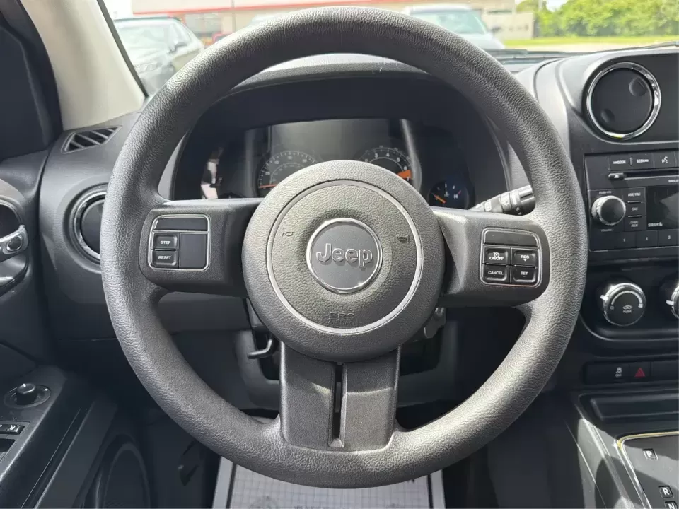 2016 Jeep Compass Sport (1C4NJCBA1GD) with an 2.0L L4 DOHC 16V engine, Automatic transmission, located at 4508 South Dixie Dr, Moraine, OH, 45439, (937) 908-9800, 39.689976, -84.218452 - **Adventure Awaits with the 2016 Jeep Compass Sport in Fairborn, OH!**<br /> <br /> Are you and your family ready to embark on thrilling weekend adventures or find the ideal companion for your daily commute? Look no further! The 2016 Jeep Compass Sport is the perfect SUV for those who need a dependa - Photo#16