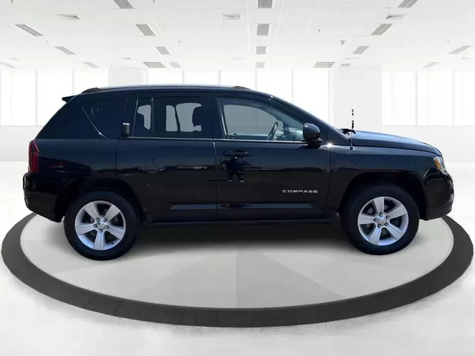 2017 Jeep Compass Latitude 4x4 (1C4NJDEB3HD) with an 2.4L I-4 DOHC engine, 6A transmission, located at 1230 East Main St, Xenia, OH, 45385, (937) 908-9800, 39.688026, -83.910172 - Ready for weekend escapes to John Bryan State Park, everyday school drop-offs, and confident winter commutes on US-35? This 2017 Jeep Compass Latitude 4x4 in Black Clearcoat is the kind of compact SUV that fits real life in Xenia, OH-easy to park around downtown, comfortable for long drives toward D - Photo#1