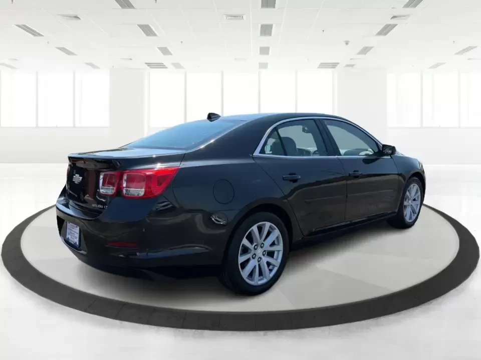 2013 Chevrolet Malibu 2LT (1G11E5SA0DF) with an ECOTEC 2.5L I-4 gasoline direct injection engine, 6-Speed Automatic transmission, located at 880 E. National Road, Vandalia, OH, 45377, (937) 908-9800, 39.891918, -84.183594 - Need a dependable sedan for the daily commute up I75, quick school drop-offs, and comfortable weekend drives to the Dayton Art Institute or a Dragons game? This 2013 Chevrolet Malibu 2LT in Black Granite Metallic fits the real-life routine of busy families, first-time buyers, and budget-conscious dr - Photo#2