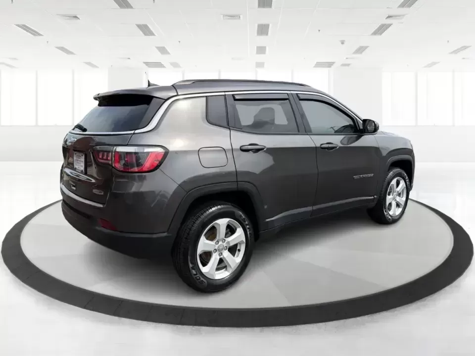 2018 Jeep Compass Latitude 4x4 (3C4NJDBB6JT) with an 2.4L L4 DOHC 16V engine, Manual/Standard transmission, located at 1099 N County Rd 25A , Troy, OH, 45373, (937) 908-9800, 40.057079, -84.212883 - Ready for weekend escapes to Hocking Hills, snowy school drop-offs, or a daily commute down I75? This 2018 Jeep Compass Latitude 4x4 is built for drivers who want SUV versatility with confident 4WD capability-great for growing families, outdoor-minded couples, and commuters who prefer a hands-on dri - Photo#2