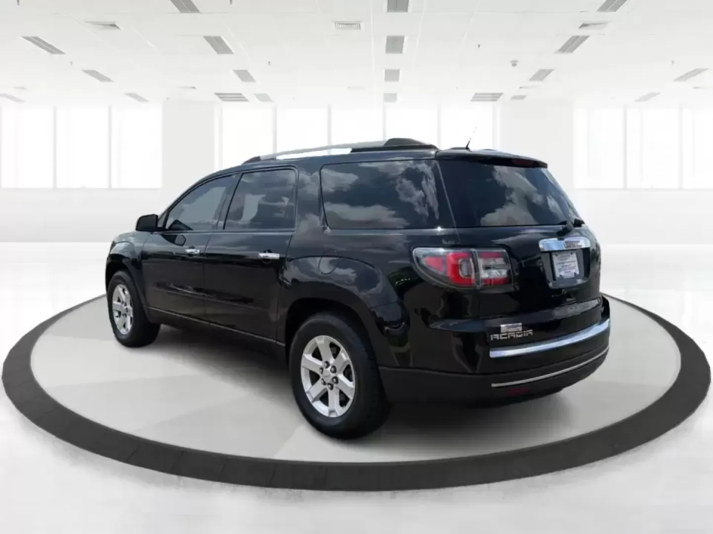 2016 GMC Acadia SLE-2 (1GKKVPKD1GJ) with an 3.6L V-6 gasoline direct injection engine, 6A transmission, located at 401 Woodman Dr, Riverside, OH, 45431, (937) 908-9800, 39.760899, -84.123421 - Need one SUV that can handle school drop-offs, long commutes, and weekend getaways to the MetroParks without feeling cramped? This 2016 GMC Acadia SLE-2 in Ebony Twilight Metallic is a smart fit for busy families and active drivers who want three-row flexibility, confident traction, and everyday com- Photo#4