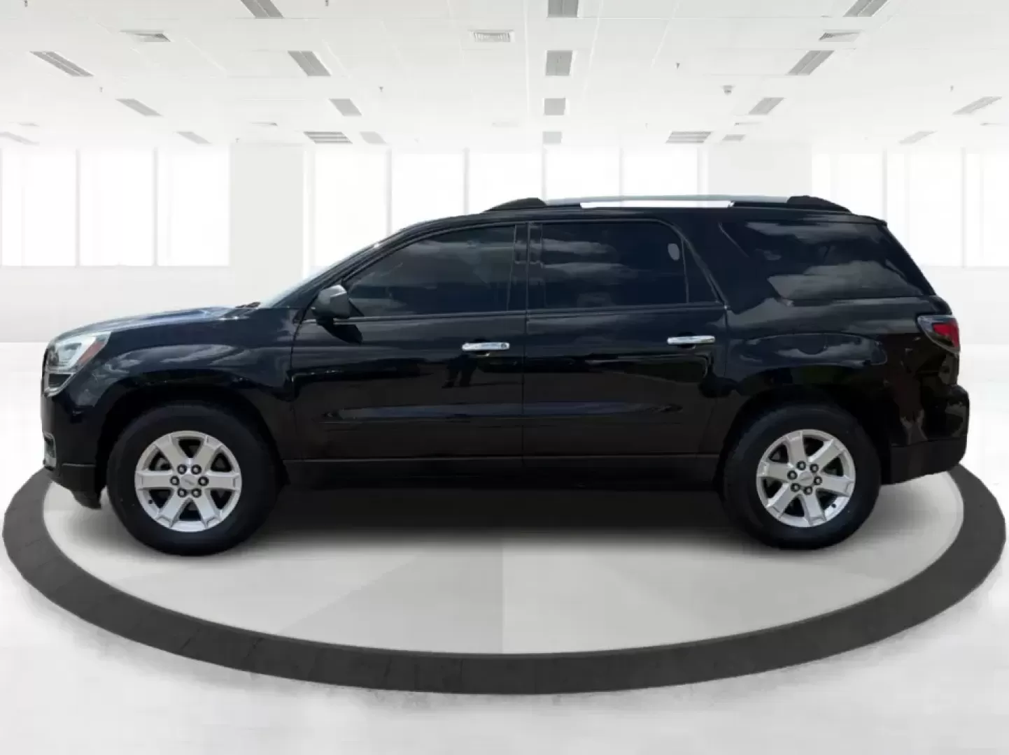 2016 GMC Acadia SLE-2 (1GKKVPKD1GJ) with an 3.6L V-6 gasoline direct injection engine, 6A transmission, located at 401 Woodman Dr, Riverside, OH, 45431, (937) 908-9800, 39.760899, -84.123421 - Need one SUV that can handle school drop-offs, long commutes, and weekend getaways to the MetroParks without feeling cramped? This 2016 GMC Acadia SLE-2 in Ebony Twilight Metallic is a smart fit for busy families and active drivers who want three-row flexibility, confident traction, and everyday com- Photo#5
