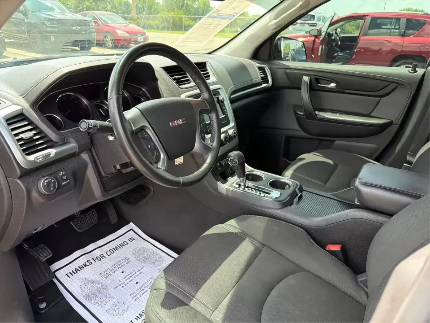 2016 GMC Acadia SLE-2 (1GKKVPKD1GJ) with an 3.6L V-6 gasoline direct injection engine, 6A transmission, located at 401 Woodman Dr, Riverside, OH, 45431, (937) 908-9800, 39.760899, -84.123421 - Need one SUV that can handle school drop-offs, long commutes, and weekend getaways to the MetroParks without feeling cramped? This 2016 GMC Acadia SLE-2 in Ebony Twilight Metallic is a smart fit for busy families and active drivers who want three-row flexibility, confident traction, and everyday com- Photo#9