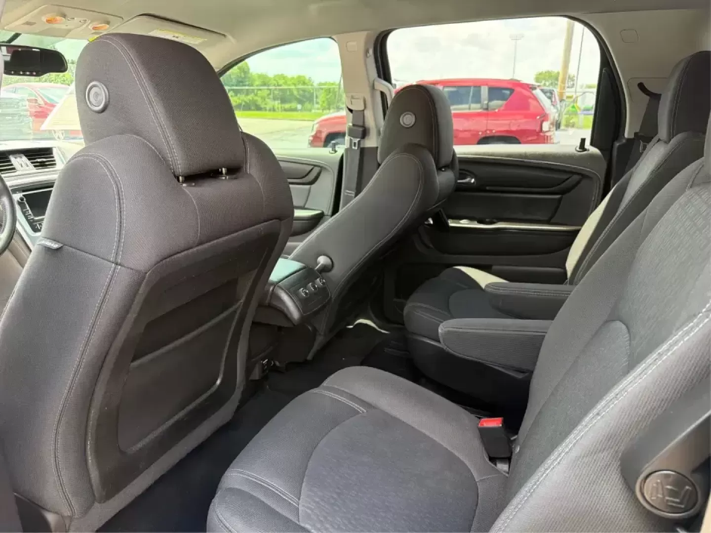 2016 GMC Acadia SLE-2 (1GKKVPKD1GJ) with an 3.6L V-6 gasoline direct injection engine, 6A transmission, located at 401 Woodman Dr, Riverside, OH, 45431, (937) 908-9800, 39.760899, -84.123421 - Need one SUV that can handle school drop-offs, long commutes, and weekend getaways to the MetroParks without feeling cramped? This 2016 GMC Acadia SLE-2 in Ebony Twilight Metallic is a smart fit for busy families and active drivers who want three-row flexibility, confident traction, and everyday com- Photo#10