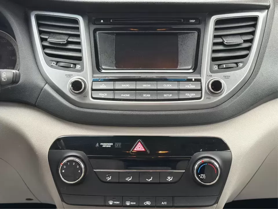 2018 Hyundai Tucson SE (KM8J2CA41JU) with an Nu 2L I-4 gasoline direct injection engine, 6A transmission, located at 4508 South Dixie Dr, Moraine, OH, 45439, (937) 908-9800, 39.689976, -84.218452 - Pack up the kids for a day at Carillon Historical Park, load camping gear for a weekend at Germantown MetroPark, or settle into a comfortable long commute down I-75-this 2018 Hyundai Tucson SE is the kind of compact SUV that fits real life in the Miami Valley. With its versatile SUV body style, conf - Photo#13