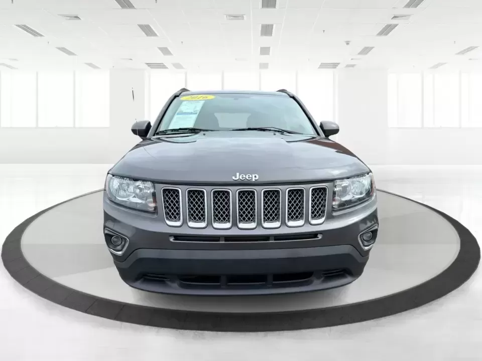 2016 Jeep Compass High Altitude Edition (1C4NJDEB2GD) with an 2.4L I-4 DOHC engine, 6A transmission, located at 8750 N County Rd 25A, Piqua, OH, 45356, (937) 908-9800, 40.164391, -84.232513 - Need a compact SUV that can handle Ohio weather, weekday commutes, and spontaneous weekend escapes without feeling bulky? This **2016 Jeep Compass High Altitude Edition 4WD** fits that lifestyle well-easy to park for errands around town, confident on wet back roads, and comfortable for longer drives - Photo#7