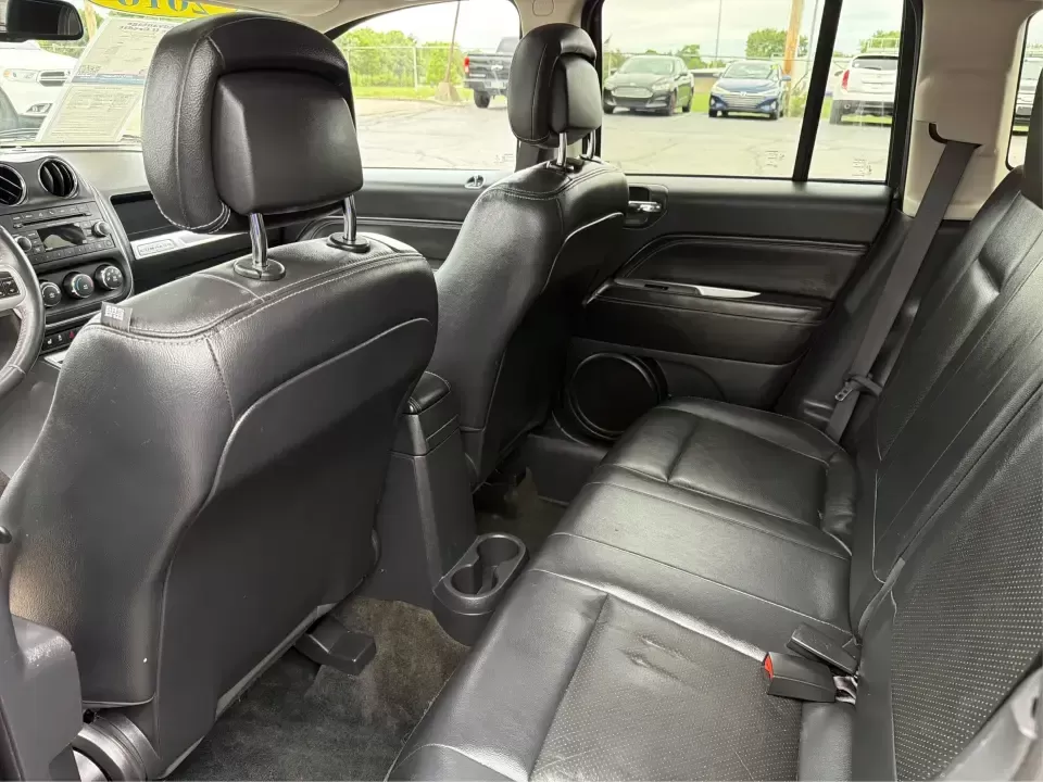 2016 Jeep Compass High Altitude Edition (1C4NJDEB2GD) with an 2.4L I-4 DOHC engine, 6A transmission, located at 8750 N County Rd 25A, Piqua, OH, 45356, (937) 908-9800, 40.164391, -84.232513 - Need a compact SUV that can handle Ohio weather, weekday commutes, and spontaneous weekend escapes without feeling bulky? This **2016 Jeep Compass High Altitude Edition 4WD** fits that lifestyle well-easy to park for errands around town, confident on wet back roads, and comfortable for longer drives - Photo#10