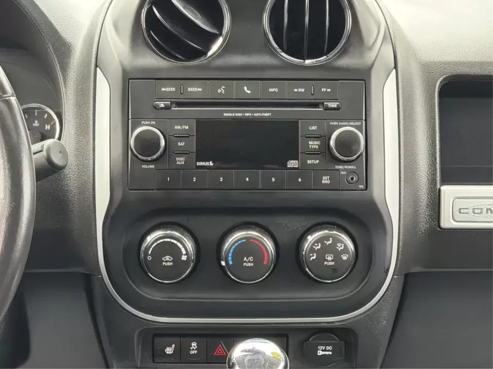 2016 Jeep Compass High Altitude Edition (1C4NJDEB2GD) with an 2.4L I-4 DOHC engine, 6A transmission, located at 8750 N County Rd 25A, Piqua, OH, 45356, (937) 908-9800, 40.164391, -84.232513 - Need a compact SUV that can handle Ohio weather, weekday commutes, and spontaneous weekend escapes without feeling bulky? This **2016 Jeep Compass High Altitude Edition 4WD** fits that lifestyle well-easy to park for errands around town, confident on wet back roads, and comfortable for longer drives - Photo#13