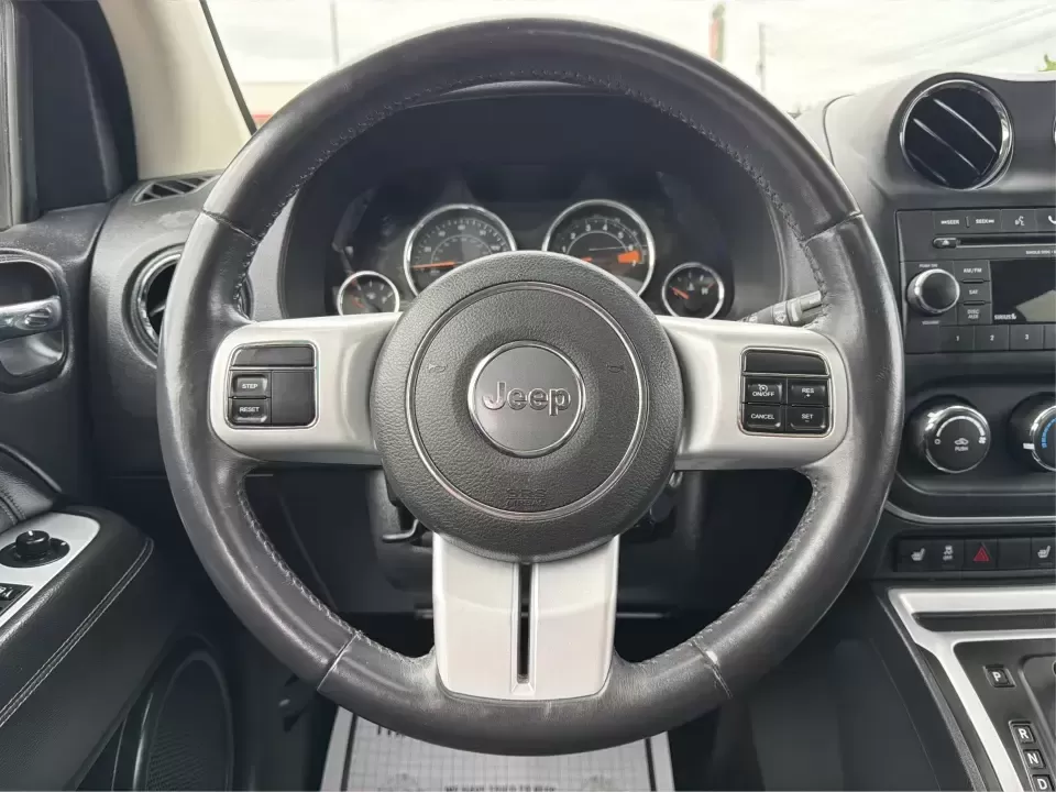 2016 Jeep Compass High Altitude Edition (1C4NJDEB2GD) with an 2.4L I-4 DOHC engine, 6A transmission, located at 8750 N County Rd 25A, Piqua, OH, 45356, (937) 908-9800, 40.164391, -84.232513 - Need a compact SUV that can handle Ohio weather, weekday commutes, and spontaneous weekend escapes without feeling bulky? This **2016 Jeep Compass High Altitude Edition 4WD** fits that lifestyle well-easy to park for errands around town, confident on wet back roads, and comfortable for longer drives - Photo#16