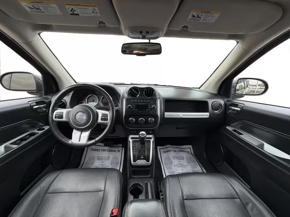 2016 Jeep Compass High Altitude Edition (1C4NJDEB2GD) with an 2.4L I-4 DOHC engine, 6A transmission, located at 8750 N County Rd 25A, Piqua, OH, 45356, (937) 908-9800, 40.164391, -84.232513 - Need a compact SUV that can handle Ohio weather, weekday commutes, and spontaneous weekend escapes without feeling bulky? This **2016 Jeep Compass High Altitude Edition 4WD** fits that lifestyle well-easy to park for errands around town, confident on wet back roads, and comfortable for longer drives - Photo#20
