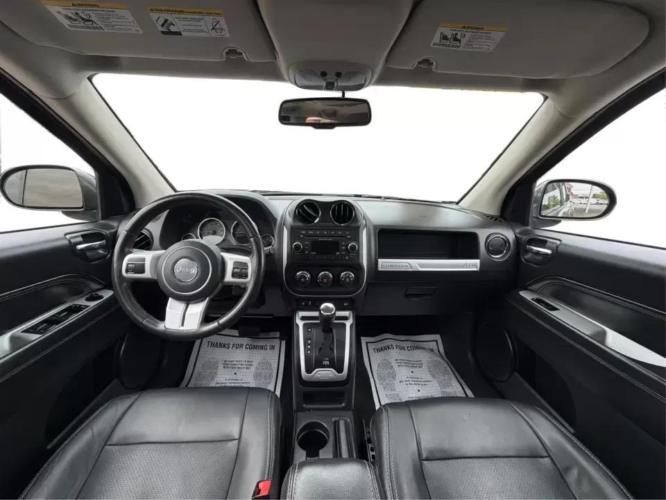 2016 Jeep Compass High Altitude Edition (1C4NJDEB2GD) with an 2.4L I-4 DOHC engine, 6A transmission, located at 8750 N County Rd 25A, Piqua, OH, 45356, (937) 908-9800, 40.164391, -84.232513 - Need a compact SUV that can handle Ohio weather, weekday commutes, and spontaneous weekend escapes without feeling bulky? This **2016 Jeep Compass High Altitude Edition 4WD** fits that lifestyle well-easy to park for errands around town, confident on wet back roads, and comfortable for longer drives - Photo#21