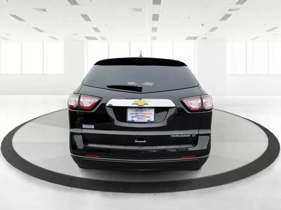 2016 Chevrolet Traverse 1LT (1GNKRGKD1GJ) with an 3.6L V-6 gasoline direct injection engine, 6A transmission, located at 8750 N County Rd 25A, Piqua, OH, 45356, (937) 908-9800, 40.164391, -84.232513 - Load up the kids, the cooler, and the weekend plans-this 2016 Chevrolet Traverse 1LT is the kind of family-ready SUV that makes school runs, long commutes, and Ohio road trips feel simpler. With three-row flexibility, a confident 3.6L V6, and everyday comfort features, it's a smart pick for growing - Photo#3