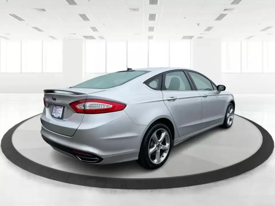 2014 Ford Fusion SE (3FA6P0H90ER) with an 2.0L L4 DOHC 16V engine, located at 1951 S Dayton Lakeview Rd., New Carlisle, OH, 45344, (937) 908-9800, 39.890999, -84.050255 - Need a smart, comfortable sedan for the daily drive from New Carlisle to Dayton, Wright-Patterson AFB, or Springfield-plus something that's still enjoyable for weekend trips to Buck Creek or an evening out near The Greene? This 2014 Ford Fusion SE blends commuter-friendly efficiency with upscale fea - Photo#2