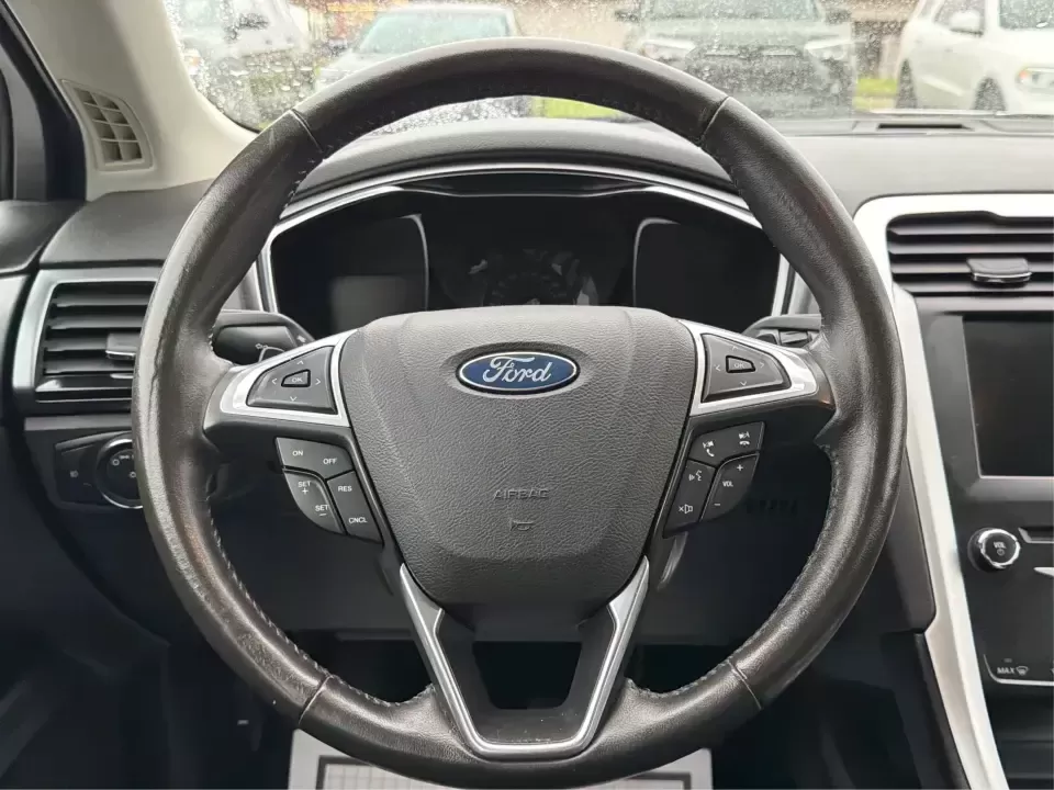 2014 Ford Fusion SE (3FA6P0H90ER) with an 2.0L L4 DOHC 16V engine, located at 1951 S Dayton Lakeview Rd., New Carlisle, OH, 45344, (937) 908-9800, 39.890999, -84.050255 - Need a smart, comfortable sedan for the daily drive from New Carlisle to Dayton, Wright-Patterson AFB, or Springfield-plus something that's still enjoyable for weekend trips to Buck Creek or an evening out near The Greene? This 2014 Ford Fusion SE blends commuter-friendly efficiency with upscale fea - Photo#16