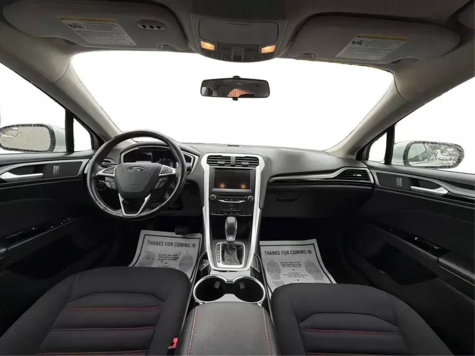2014 Ford Fusion SE (3FA6P0H90ER) with an 2.0L L4 DOHC 16V engine, located at 1951 S Dayton Lakeview Rd., New Carlisle, OH, 45344, (937) 908-9800, 39.890999, -84.050255 - Need a smart, comfortable sedan for the daily drive from New Carlisle to Dayton, Wright-Patterson AFB, or Springfield-plus something that's still enjoyable for weekend trips to Buck Creek or an evening out near The Greene? This 2014 Ford Fusion SE blends commuter-friendly efficiency with upscale fea - Photo#22