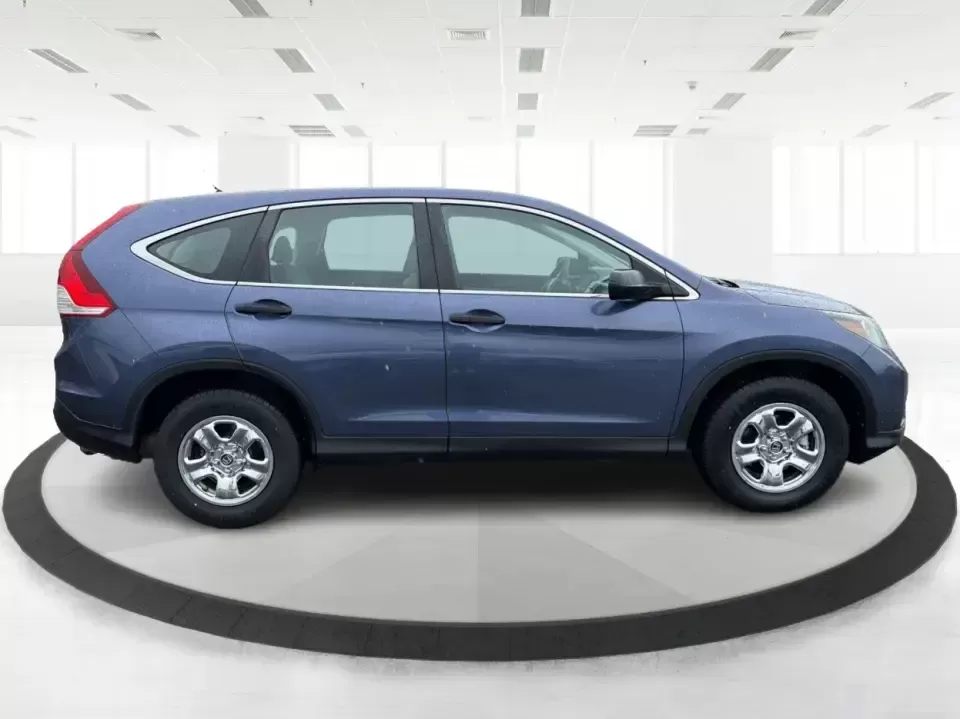 2014 Honda CR-V LX (2HKRM4H30EH) with an 2.4L I-4 DOHC engine, 5-Speed Automatic transmission, located at 401 Woodman Dr, Riverside, OH, 45431, (937) 908-9800, 39.760899, -84.123421 - Picture your next weekend: a quick run down Woodman Dr for errands, a family day at Riverscape MetroPark, or an easy I675 commute with room for groceries, strollers, and sports gear. This 2014 Honda CRV LX in Twilight Blue Metallic is the kind of practical SUV that fits real life in Riverside, Ohio- - Photo#1