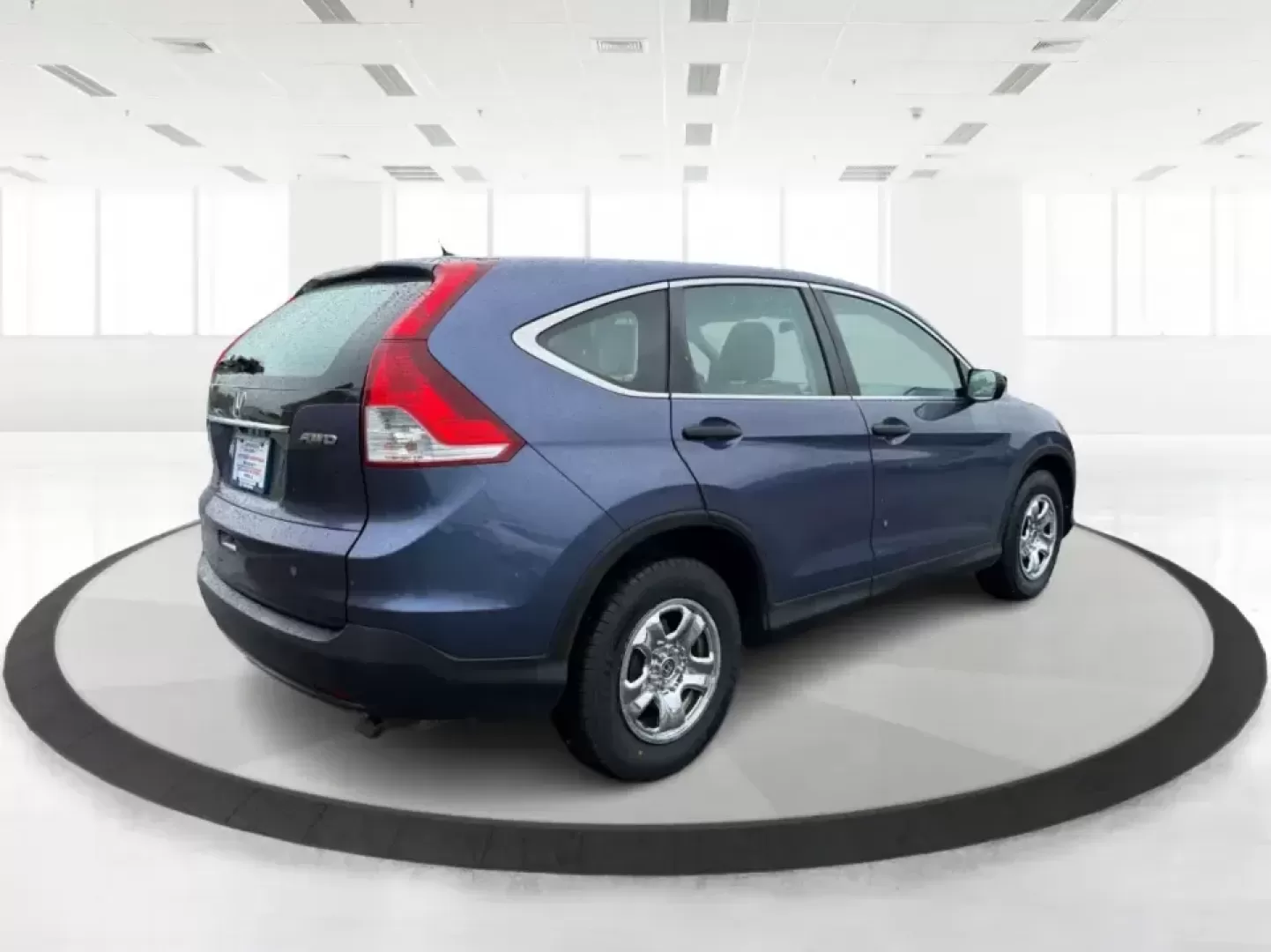 2014 Honda CR-V LX (2HKRM4H30EH) with an 2.4L I-4 DOHC engine, 5-Speed Automatic transmission, located at 401 Woodman Dr, Riverside, OH, 45431, (937) 908-9800, 39.760899, -84.123421 - Picture your next weekend: a quick run down Woodman Dr for errands, a family day at Riverscape MetroPark, or an easy I675 commute with room for groceries, strollers, and sports gear. This 2014 Honda CRV LX in Twilight Blue Metallic is the kind of practical SUV that fits real life in Riverside, Ohio- - Photo#2