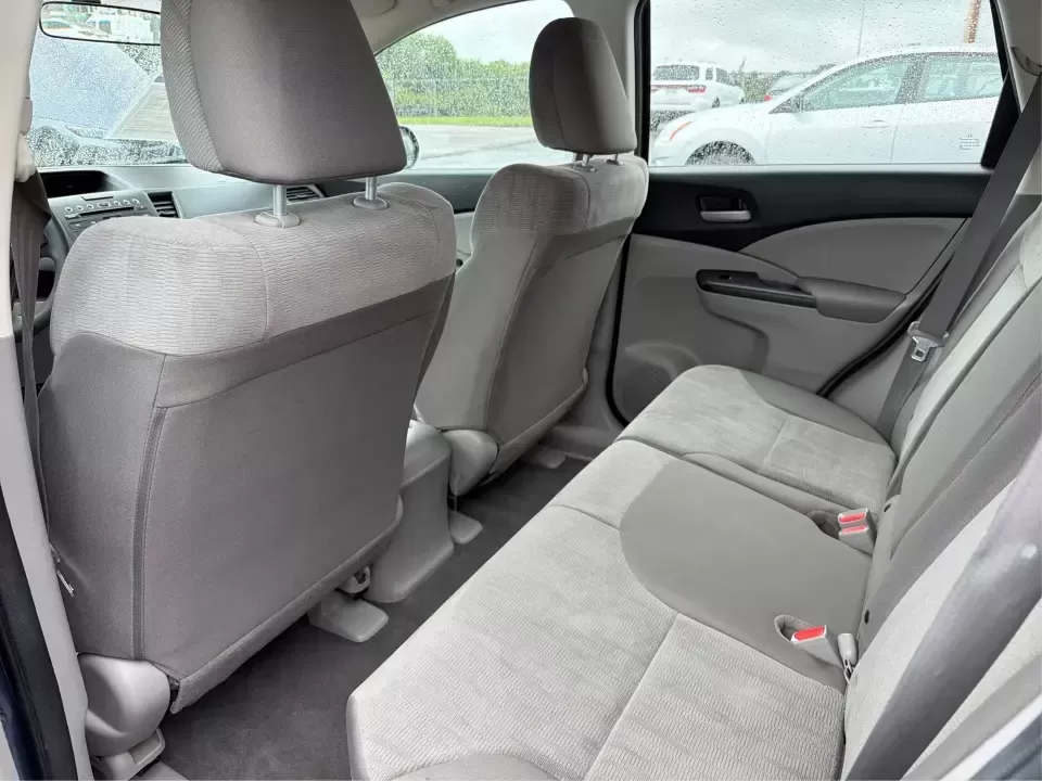 2014 Honda CR-V LX (2HKRM4H30EH) with an 2.4L I-4 DOHC engine, 5-Speed Automatic transmission, located at 401 Woodman Dr, Riverside, OH, 45431, (937) 908-9800, 39.760899, -84.123421 - Picture your next weekend: a quick run down Woodman Dr for errands, a family day at Riverscape MetroPark, or an easy I675 commute with room for groceries, strollers, and sports gear. This 2014 Honda CRV LX in Twilight Blue Metallic is the kind of practical SUV that fits real life in Riverside, Ohio- - Photo#10