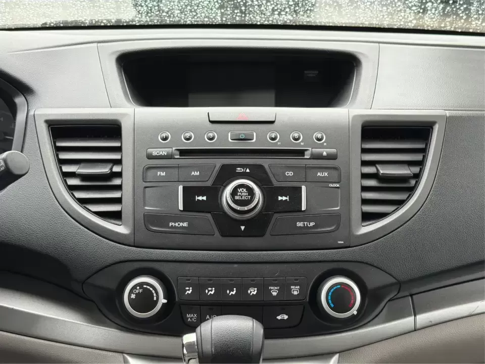 2014 Honda CR-V LX (2HKRM4H30EH) with an 2.4L I-4 DOHC engine, 5-Speed Automatic transmission, located at 401 Woodman Dr, Riverside, OH, 45431, (937) 908-9800, 39.760899, -84.123421 - Picture your next weekend: a quick run down Woodman Dr for errands, a family day at Riverscape MetroPark, or an easy I675 commute with room for groceries, strollers, and sports gear. This 2014 Honda CRV LX in Twilight Blue Metallic is the kind of practical SUV that fits real life in Riverside, Ohio- - Photo#12