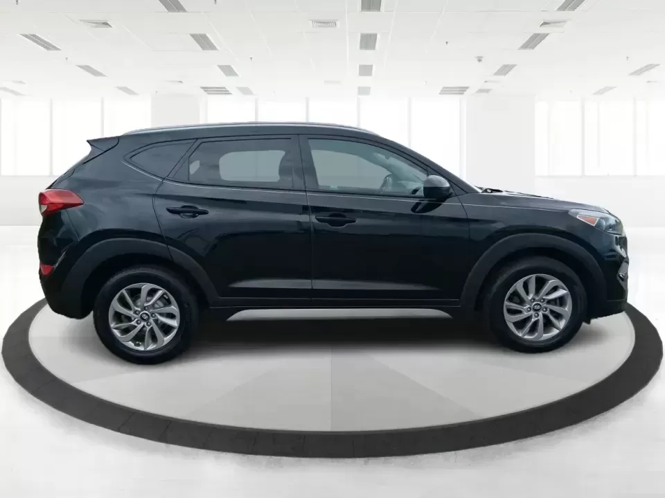 2018 Hyundai Tucson SEL (KM8J33A41JU) with an Nu 2L I-4 gasoline direct injection engine, 6A transmission, located at 880 E. National Road, Vandalia, OH, 45377, (937) 908-9800, 39.891918, -84.183594 - Picture your next week: an easy school drop-off, a smooth commute down US-35, and a weekend escape to Caesar Creek with enough room for coolers, strollers, or hiking gear. This 2018 Hyundai Tucson SEL is the kind of compact SUV that fits real life in Xenia-practical for growing families, comfortable - Photo#1