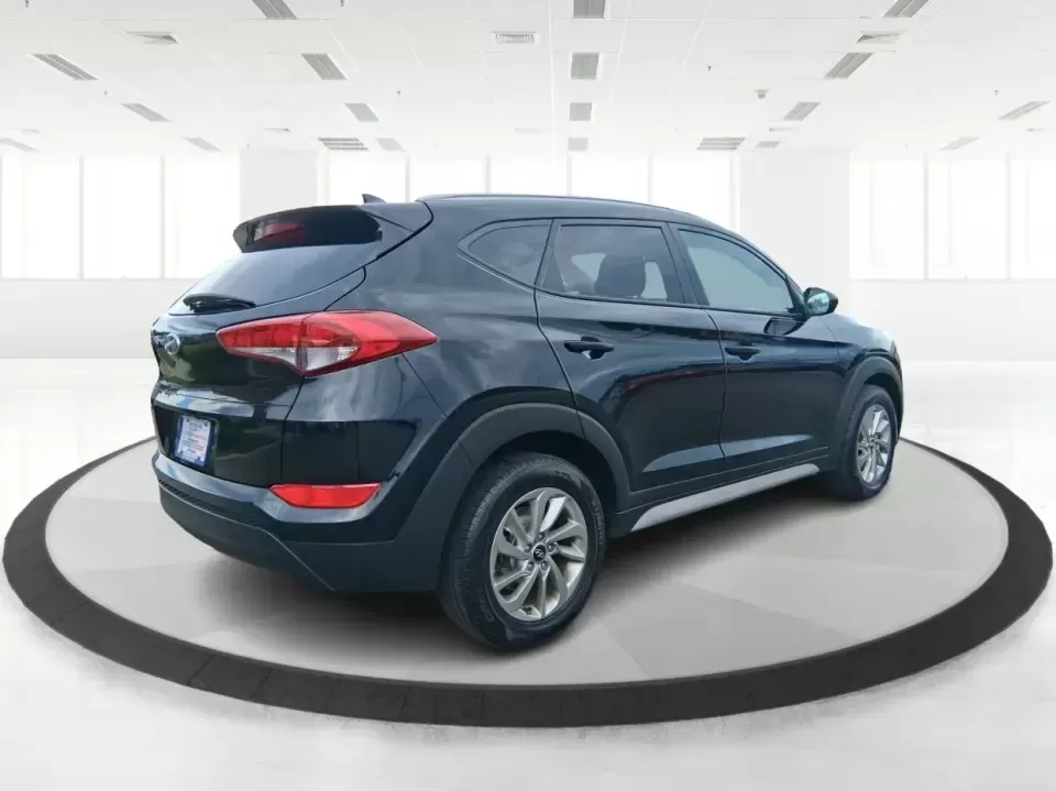 2018 Hyundai Tucson SEL (KM8J33A41JU) with an Nu 2L I-4 gasoline direct injection engine, 6A transmission, located at 880 E. National Road, Vandalia, OH, 45377, (937) 908-9800, 39.891918, -84.183594 - Picture your next week: an easy school drop-off, a smooth commute down US-35, and a weekend escape to Caesar Creek with enough room for coolers, strollers, or hiking gear. This 2018 Hyundai Tucson SEL is the kind of compact SUV that fits real life in Xenia-practical for growing families, comfortable - Photo#2